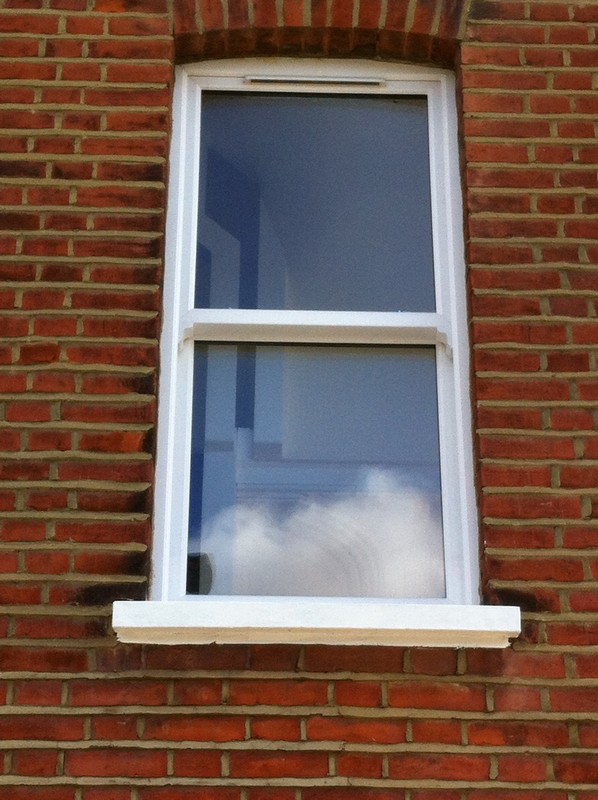 uPVC sash window on Victorian red brick house in Totteridge